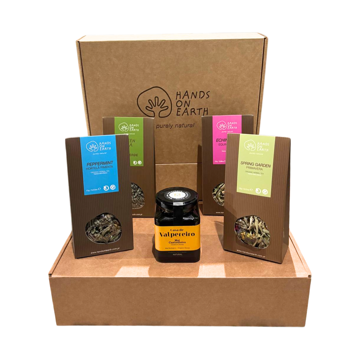 Cabaz Chá das 5 Hands on Earth com tisanas biológicas, chá verde, mel premium português e produtos gourmet para um momento de chá especial.