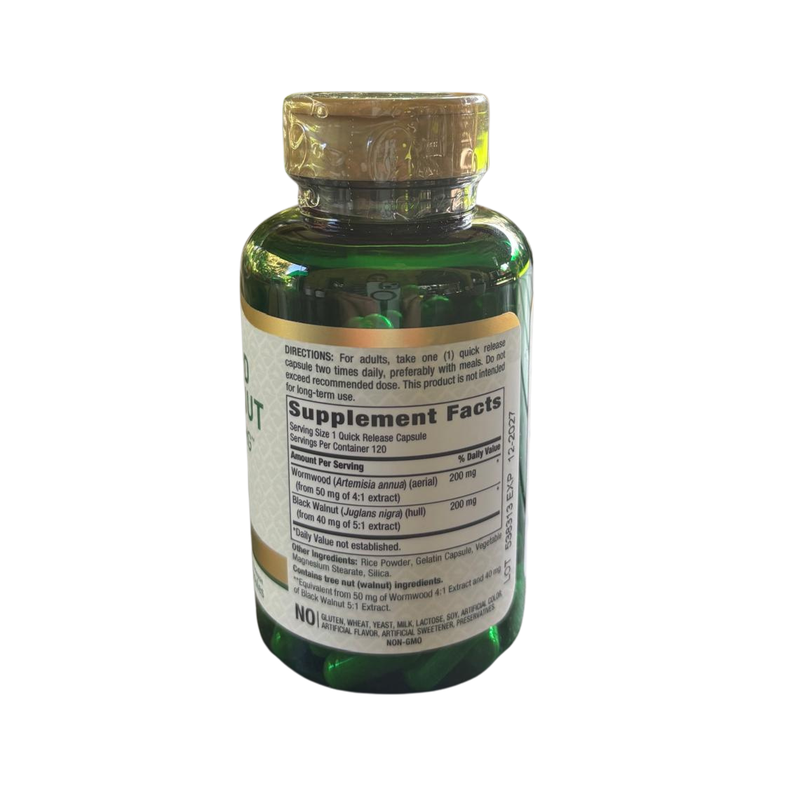 Back of the Hands on Earth Wormwood & Black Walnut Complex 400mg supplement bottle, showing nutritional information and directions for use.
