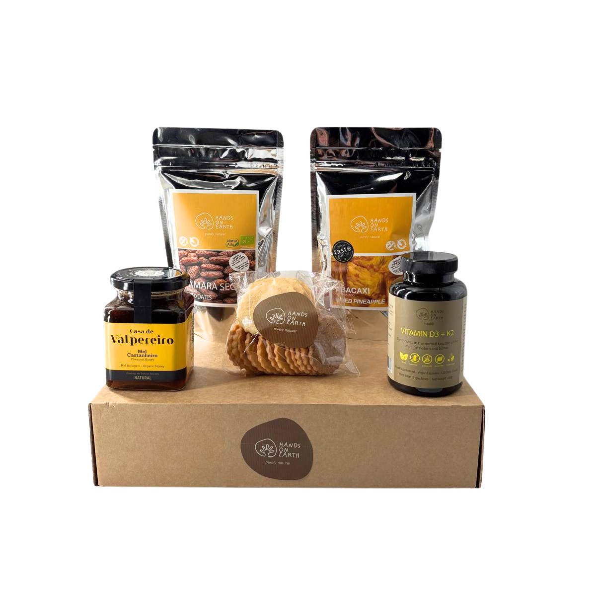 Cabaz presente premium Hands on Earth com abacaxi desidratado, suplemento de vitamina D3 + K2, tâmaras biológicas, bolachas artesanais e mel de castanheiro biológico